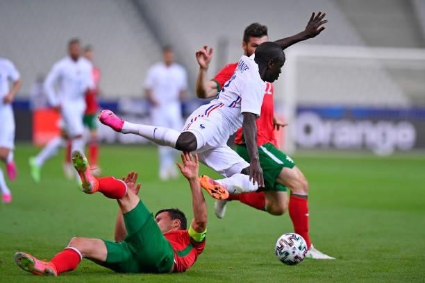 Ngolo Kante of France is tackled by Vasil Bozhikov of Bulgaria during the international friendly match between France and Bulgaria at Stade de France...