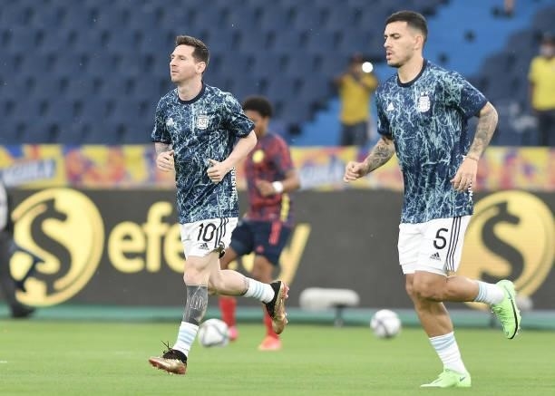 Lionel Messi of Argentina and Leandro Paredes of Argentina warm up before a match between Colombia and Argentina as part of South American Qualifiers...