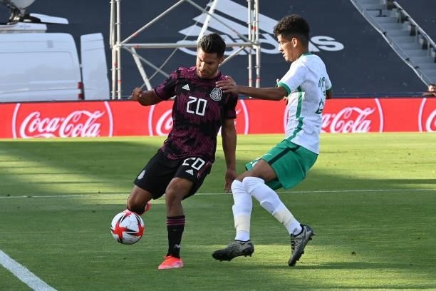 Eduardo Aguirre of Mexico fights for the ball with Abdulbasit Mohammed of Arabia Saudita during the international friendly match between Mexico U23...