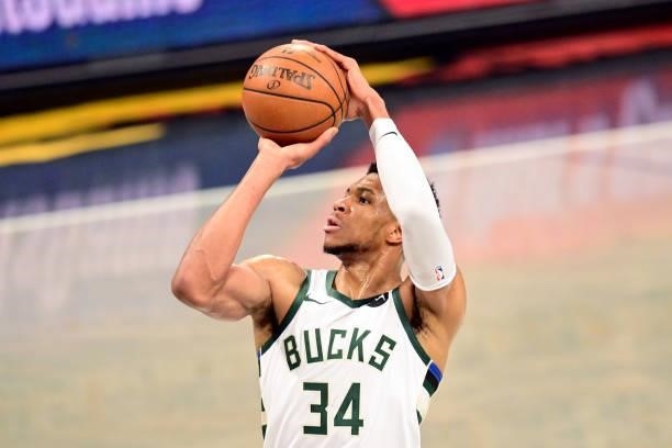 Giannis Antetokounmpo of the Milwaukee Bucks attempts a shot against the Brooklyn Nets in Game Two of the Second Round of the 2021 NBA Playoffs at...