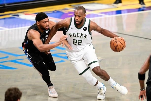 Khris Middleton of the Milwaukee Bucks is defended by Bruce Brown of the Brooklyn Nets in Game Two of the Second Round of the 2021 NBA Playoffs at...