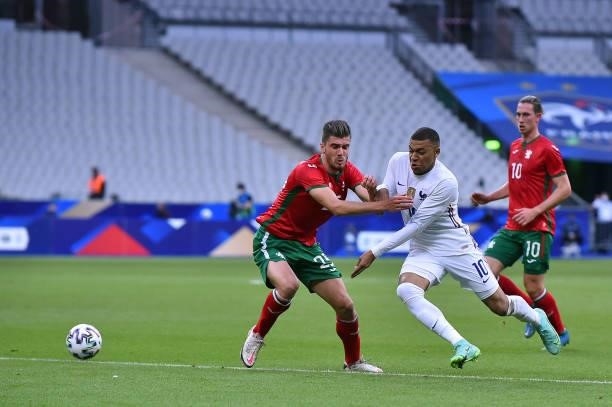 Kylian Mbappe of France runs with the ball during the international friendly match between France and Bulgaria at Stade de France on June 08, 2021 in...