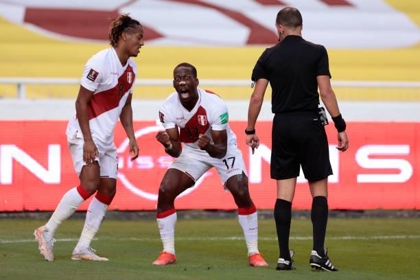 Luis Advíncula of Peru celebrates after scoring the second goal of his team during a match between Ecuador and Peru as part of South American...