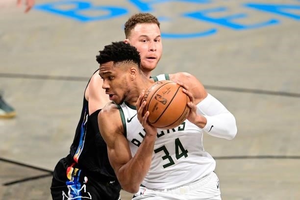 Giannis Antetokounmpo of the Milwaukee Bucks is defended by Blake Griffin of the Brooklyn Nets in Game Two of the Second Round of the 2021 NBA...