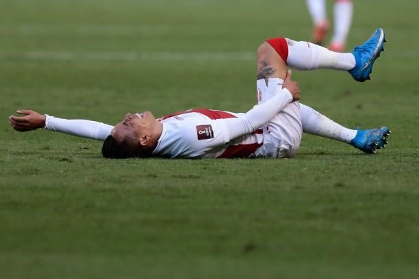 Christian Cueva of Peru reacts after a foul during a match between Ecuador and Peru as part of South American Qualifiers for Qatar 2022 at Rodrigo...