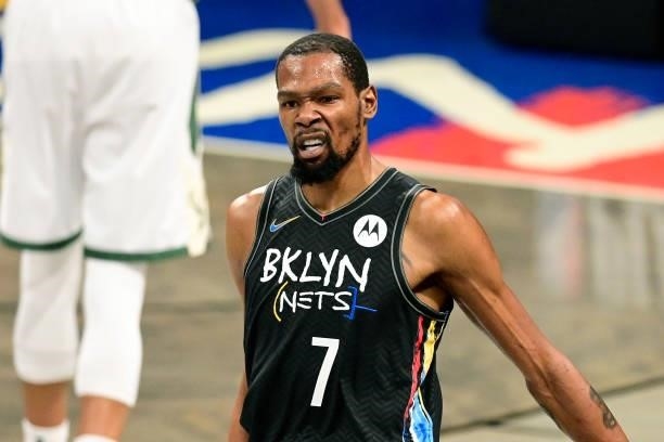 Kevin Durant of the Brooklyn Nets celebrates a basket against the Milwaukee Bucks in Game Two of the Second Round of the 2021 NBA Playoffs at...
