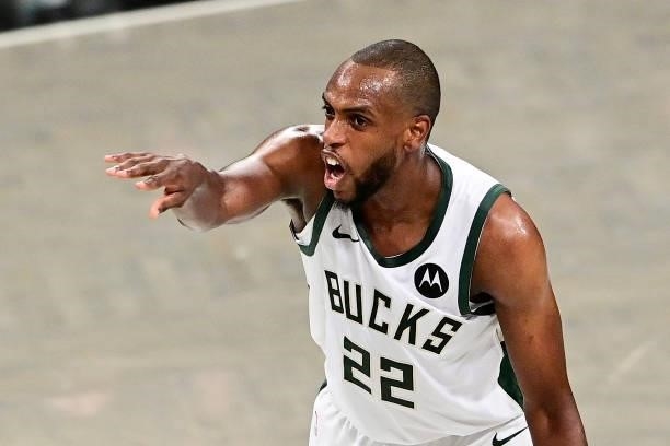 Khris Middleton of the Milwaukee Bucks directs the offense against the Brooklyn Nets in Game Two of the Second Round of the 2021 NBA Playoffs at...