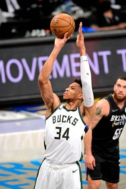 Giannis Antetokounmpo of the Milwaukee Bucks attempts a free throw against the Brooklyn Nets in Game Two of the Second Round of the 2021 NBA Playoffs...