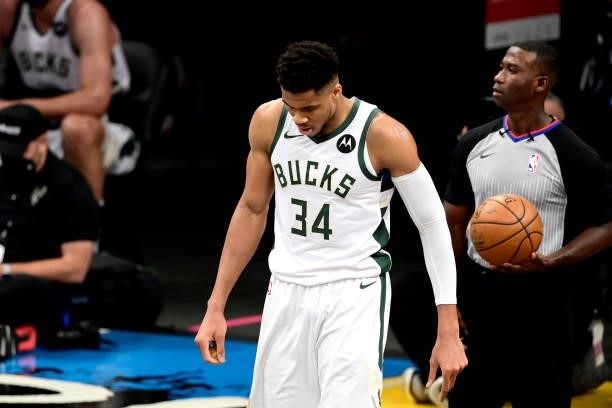 Giannis Antetokounmpo of the Milwaukee Bucks reacts against the Brooklyn Nets in Game Two of the Second Round of the 2021 NBA Playoffs at Barclays...
