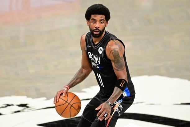 Kyrie Irving of the Brooklyn Nets handles the ball against the Milwaukee Bucks in Game Two of the Second Round of the 2021 NBA Playoffs at Barclays...