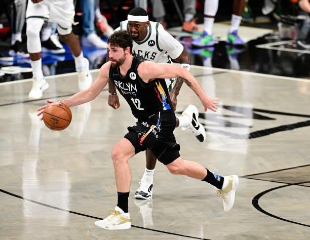 Joe Harris of the Brooklyn Nets handles the ball against the Milwaukee Bucks in Game Two of the Second Round of the 2021 NBA Playoffs at Barclays...