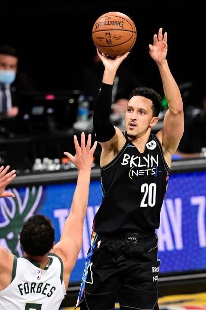 Landry Shamet of the Brooklyn Nets scores on a jump shot against the Milwaukee Bucks in Game Two of the Second Round of the 2021 NBA Playoffs at...