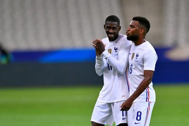 Ousmane Dembele and Thomas Lemar of France speak after the international friendly match between France and Bulgaria at Stade de France on June 08,...