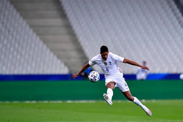 Raphael Varane of France kicks the ball during the international friendly match between France and Bulgaria at Stade de France on June 08, 2021 in...
