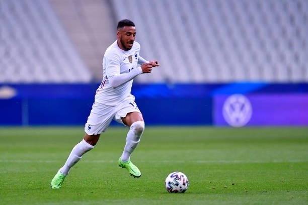 Corentin Tolisso of France runs with the ball during the international friendly match between France and Bulgaria at Stade de France on June 08, 2021...