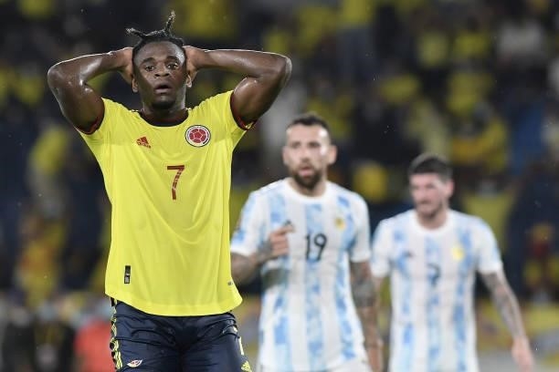 Duvan Zapata of Colombia reacts after missing a chance of goal during a match between Colombia and Argentina as part of South American Qualifiers for...