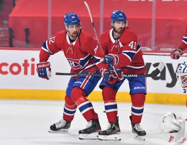 Erik Gustafsson and teammate Paul Byron of the Montreal Canadiens skate during warm-ups against the Winnipeg Jets in Game Four of the Second Round of...