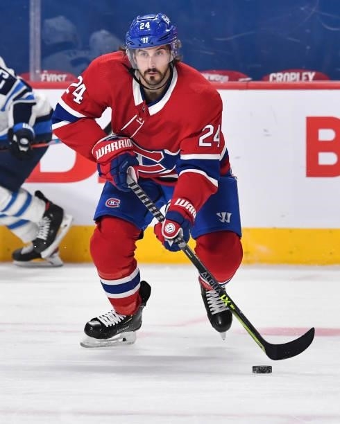 Phillip Danault of the Montreal Canadiens skates the puck against the Winnipeg Jets during the first period in Game Four of the Second Round of the...