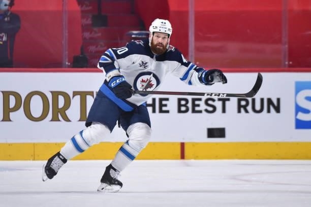 Jordie Benn of the Winnipeg Jets skates against the Montreal Canadiens during the third period in Game Four of the Second Round of the 2021 Stanley...