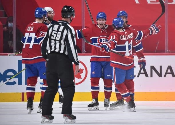 Artturi Lehkonen of the Montreal Canadiens celebrates his goal with teammates Brett Kulak, Phillip Danault and Brendan Gallagher against the Winnipeg...