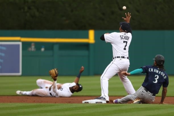 Jonathan Schoop of the Detroit Tigers forces out J.P. Crawford of the Seattle Mariners at second bast on a throw from Niko Goodrum during the first...