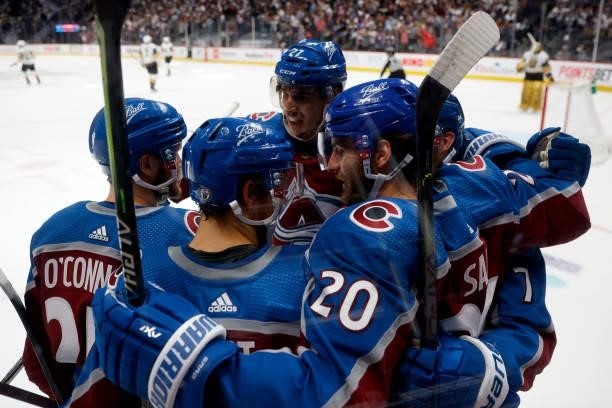 Brandon Saad of the Colorado Avalanche is congratulated by his teammates after scoring a goal against the Vegas Golden Knights during the first...