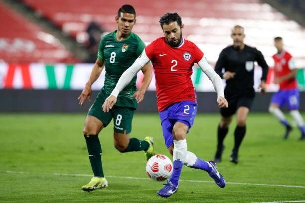 Eugenio Mena of Chile controls de ball during a match between Chile and Bolivia as part of South American Qualifiers for Qatar 2022 at Estadio San...