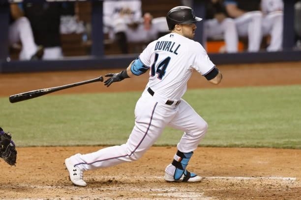 Adam Duvall of the Miami Marlins hits a RBI single during the seventh inning against the Colorado Rockies at loanDepot park on June 08, 2021 in...