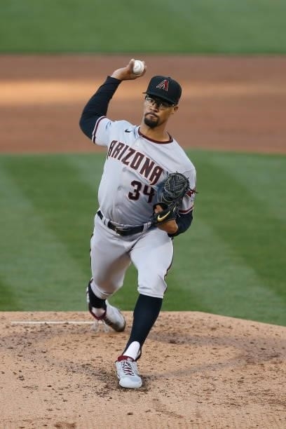Jon Duplantier of the Arizona Diamondbacks pitches in the bottom of the second inning against the Oakland Athletics at RingCentral Coliseum on June...