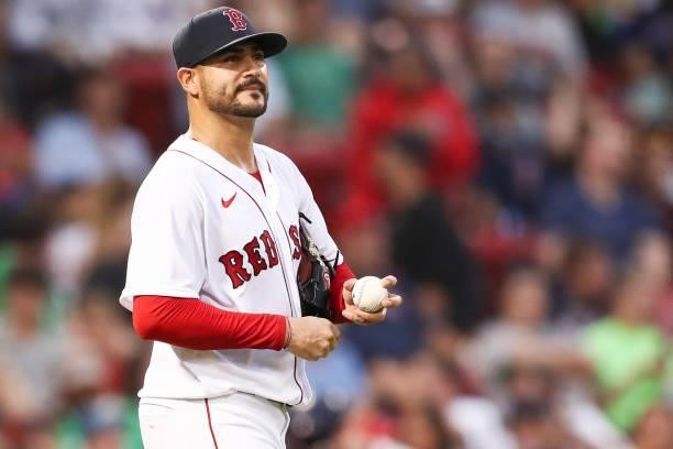 Martin Perez of the Boston Red Sox reacts after giving up a run in the second inning of a game against the Houston Astros at Fenway Park on June 8,...