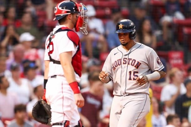 Martin Maldonado of the Houston Astros scores in the second inning of a game against the Boston Red Sox at Fenway Park on June 8, 2021 in Boston,...