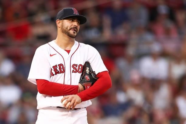 Martin Perez of the Boston Red Sox reacts after giving up a run in the second inning of a game against the Houston Astros at Fenway Park on June 8,...