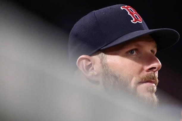 Chris Sale of the Boston Red Sox looks on from the dugout during a game against the Houston Astros at Fenway Park on June 8, 2021 in Boston,...