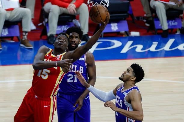 Clint Capela of the Atlanta Hawks shoots a layup over Tobias Harris of the Philadelphia 76ers during the third quarter during Game Two of the Eastern...