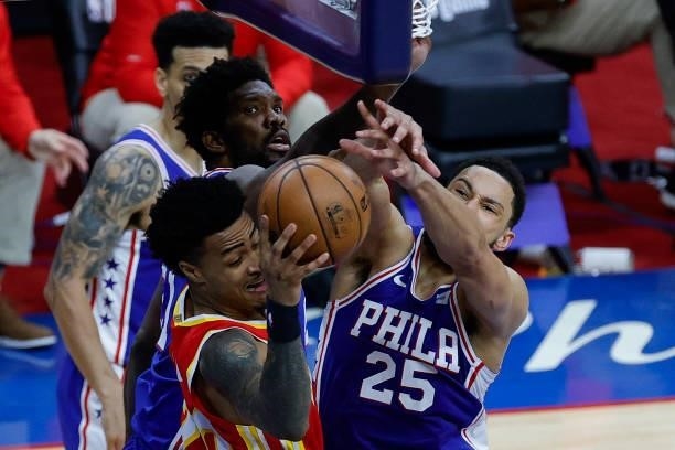 Ben Simmons of the Philadelphia 76ers blocks John Collins of the Atlanta Hawks during the third quarter during Game Two of the Eastern Conference...
