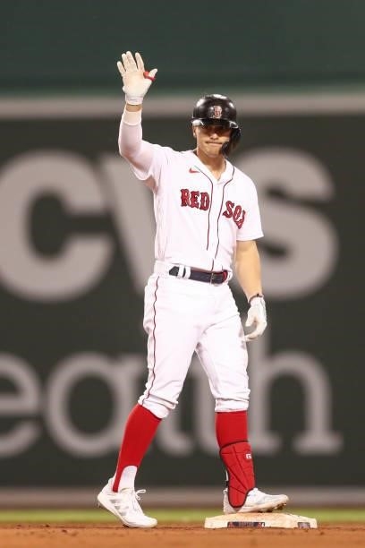 Enrique Hernandez of the Boston Red Sox reacts after hitting a double in a game against the Houston Astros at Fenway Park on June 8, 2021 in Boston,...