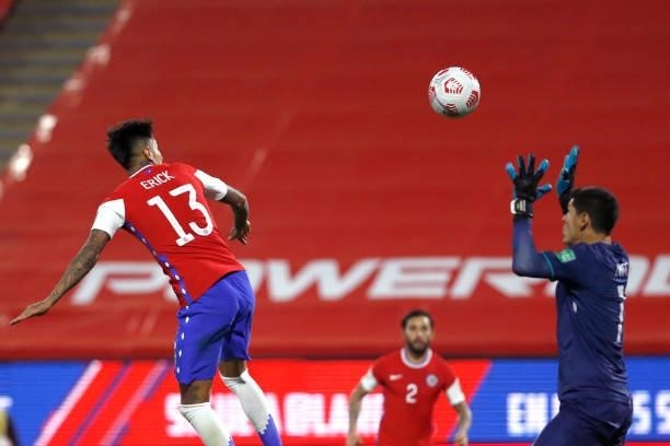 Erick Pulgar of Chile heads the ball to score the first goal of his team during a match between Chile and Bolivia as part of South American...
