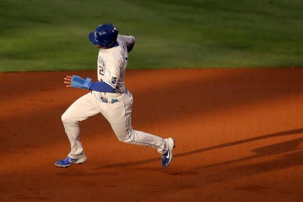 Michael A. Taylor of the Kansas City Royals runs around the bases after an RBI double by Hunter Dozier during the second inning against the Los...