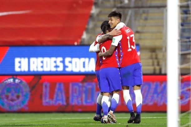 Erick Pulgar of Chile celebrates with teammates after scoring the first goal of his team during a match between Chile and Bolivia as part of South...