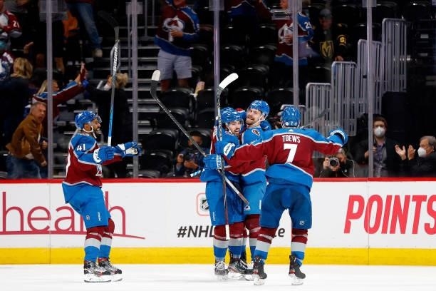 Joonas Donskoi of the Colorado Avalanche celebrates with Alex Newhook and Devon Toews and Pierre-Edouard Bellemare after scoring against the Vegas...