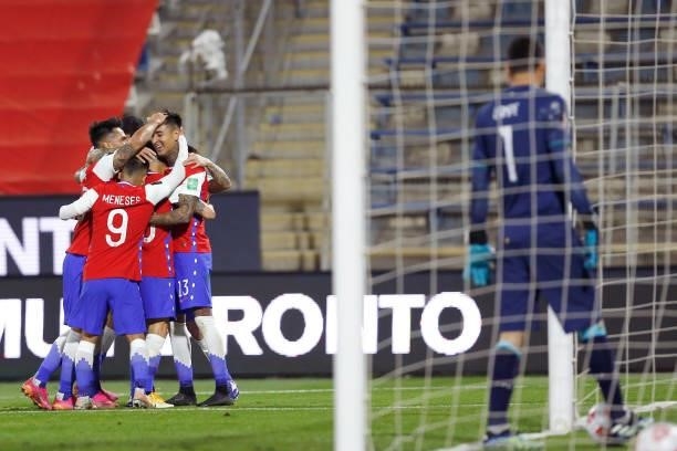 Erick Pulgar of Chile celebrates with teammates after scoring the first goal of his team during a match between Chile and Bolivia as part of South...