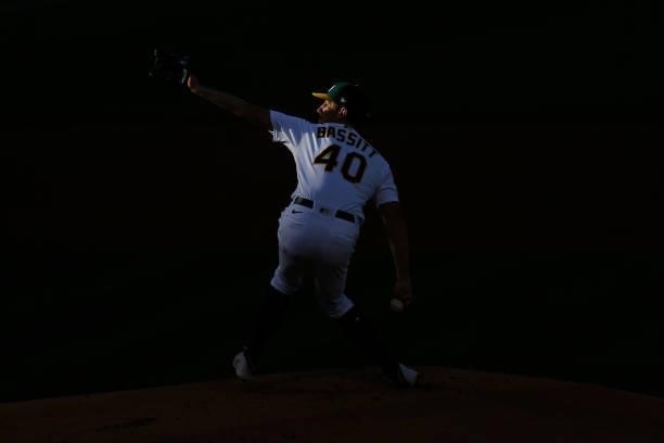 Chris Bassitt of the Oakland Athletics pitches in the top of the first inning against the Arizona Diamondbacks at RingCentral Coliseum on June 08,...