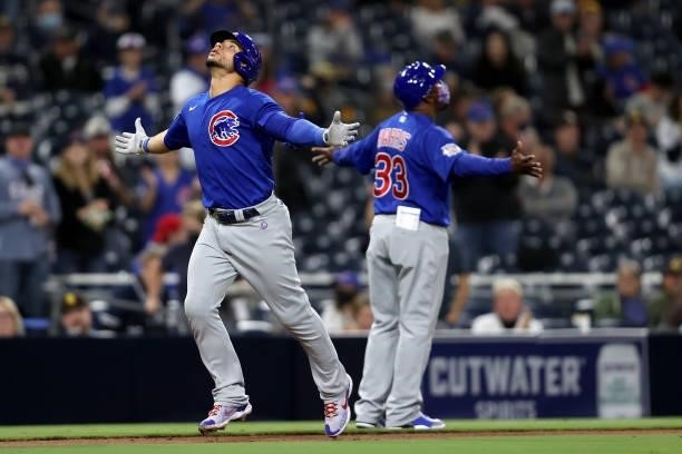 Willson Contreras of the Chicago Cubs reacts as he rounds third base after hitting a solo homerun during the fourth inning of a game against the San...