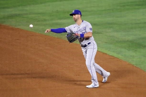 Whit Merrifield of the Kansas City Royals makes the play to first base during the sixth inning against the Los Angeles Angels at Angel Stadium of...