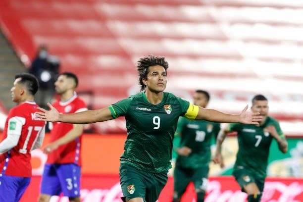 Marcelo Moreno Martins of Bolivia celebrates after scoring the first goal of his team during a match between Chile and Bolivia as part of South...
