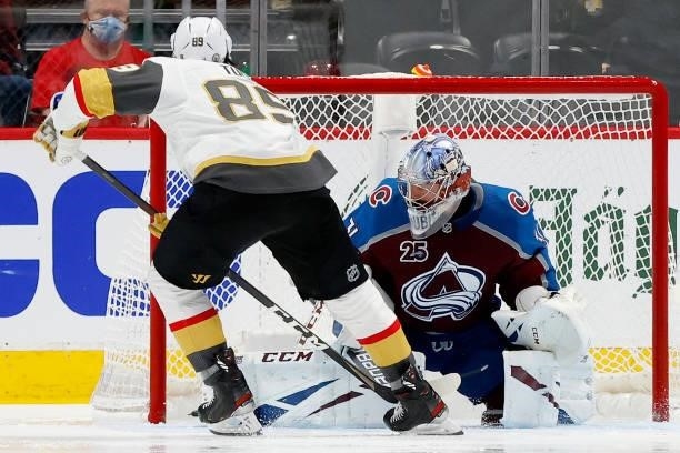 Alex Tuch of the Vegas Golden Knights scores against Philipp Grubauer of the Colorado Avalanche during the third period in Game Five of the Second...