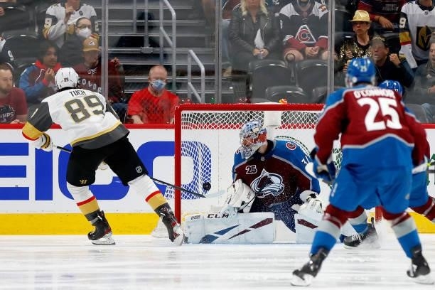 Alex Tuch of the Vegas Golden Knights scores against Philipp Grubauer of the Colorado Avalanche during the third period in Game Five of the Second...