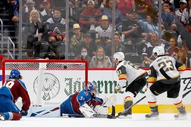 Jonathan Marchessault of the Vegas Golden Knights scores against Philipp Grubauer of the Colorado Avalanche during the third period in Game Five of...