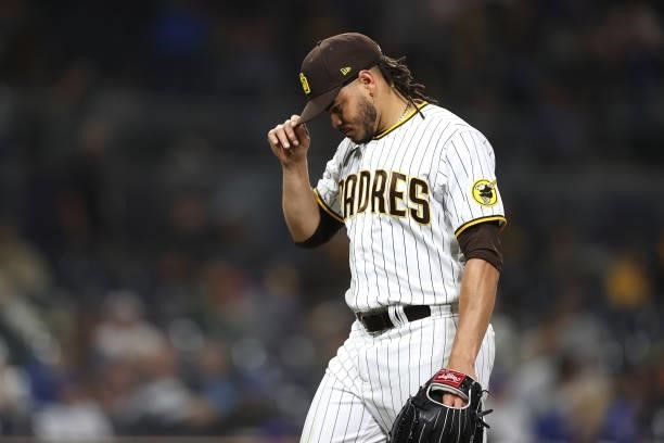 Dinelson Lamet of the San Diego Padres looks on after being pulled from the game during the sixrth inning of a game against the Chicago Cubs at PETCO...