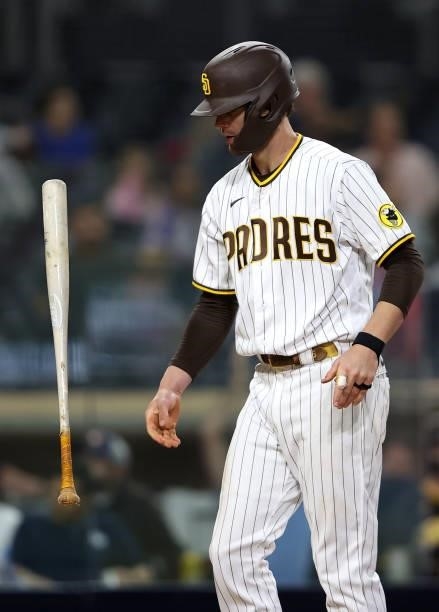 Wil Myers of the San Diego Padres flips his bat after striking out during the fifth inning of a game against the Chicago Cubs at PETCO Park on June...